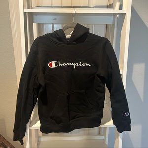 Black champion hoodie size large in kids or small for woman
